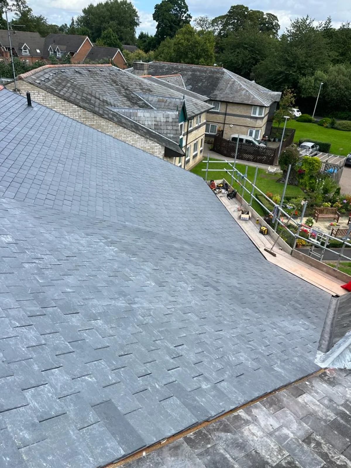 A completed natural slate roof on a building